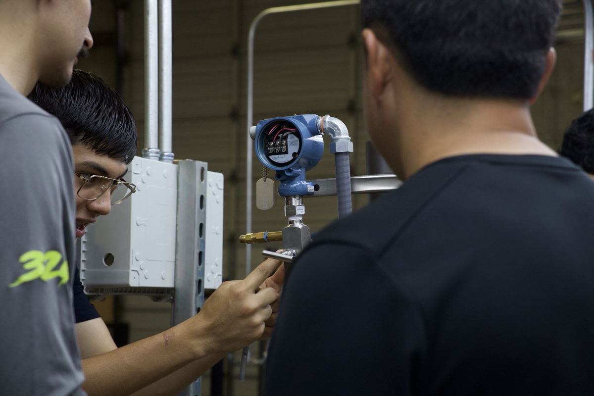 South Texas Trades Academy students working on a pressure transmitter